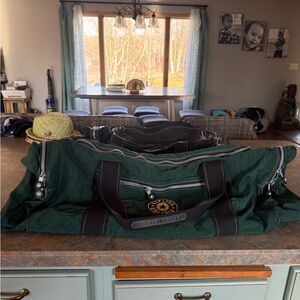 Kipling Dark Green Duffel Bag with Brown Accents